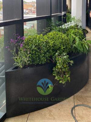 Curved aluminium planters
